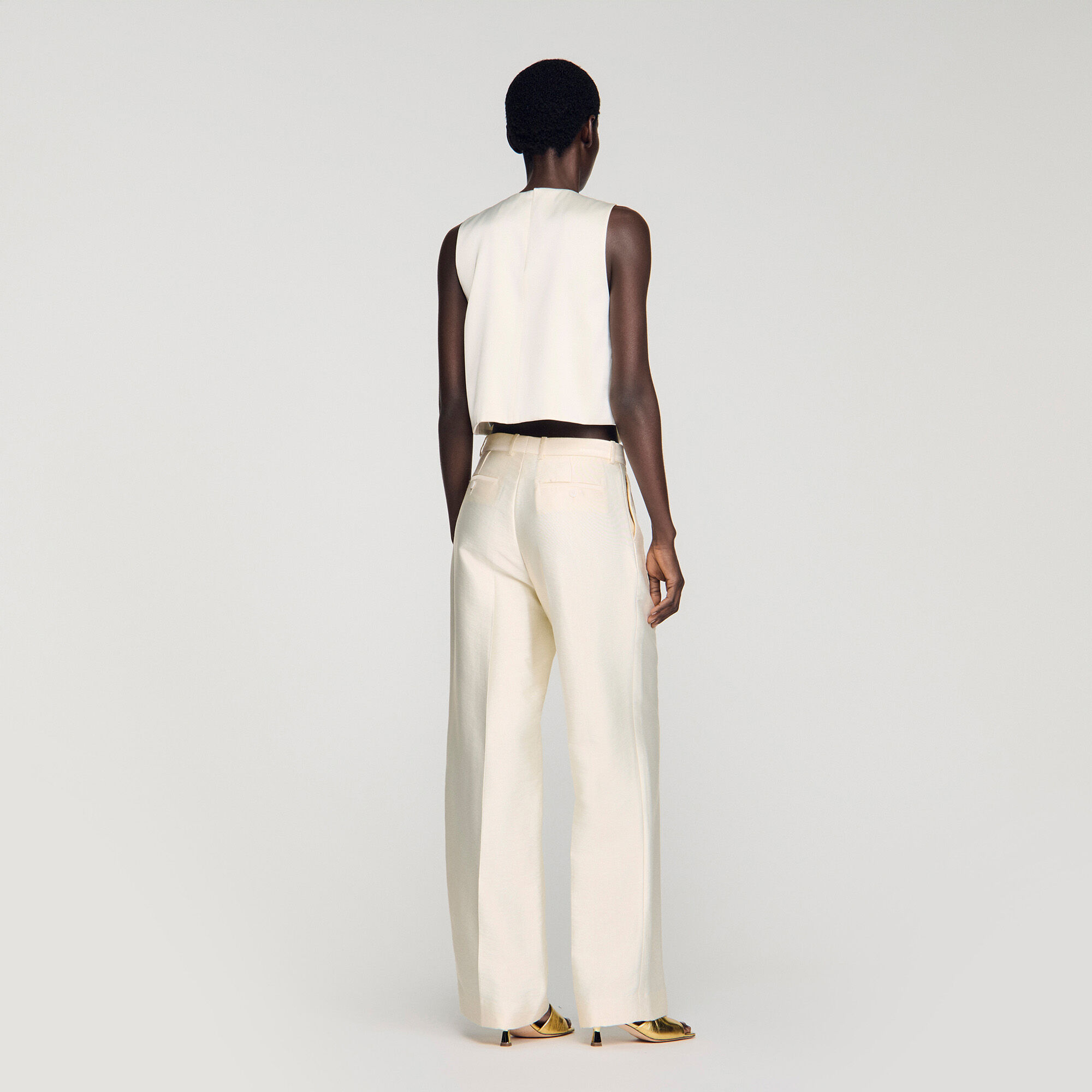 Skiftande knut crop top
