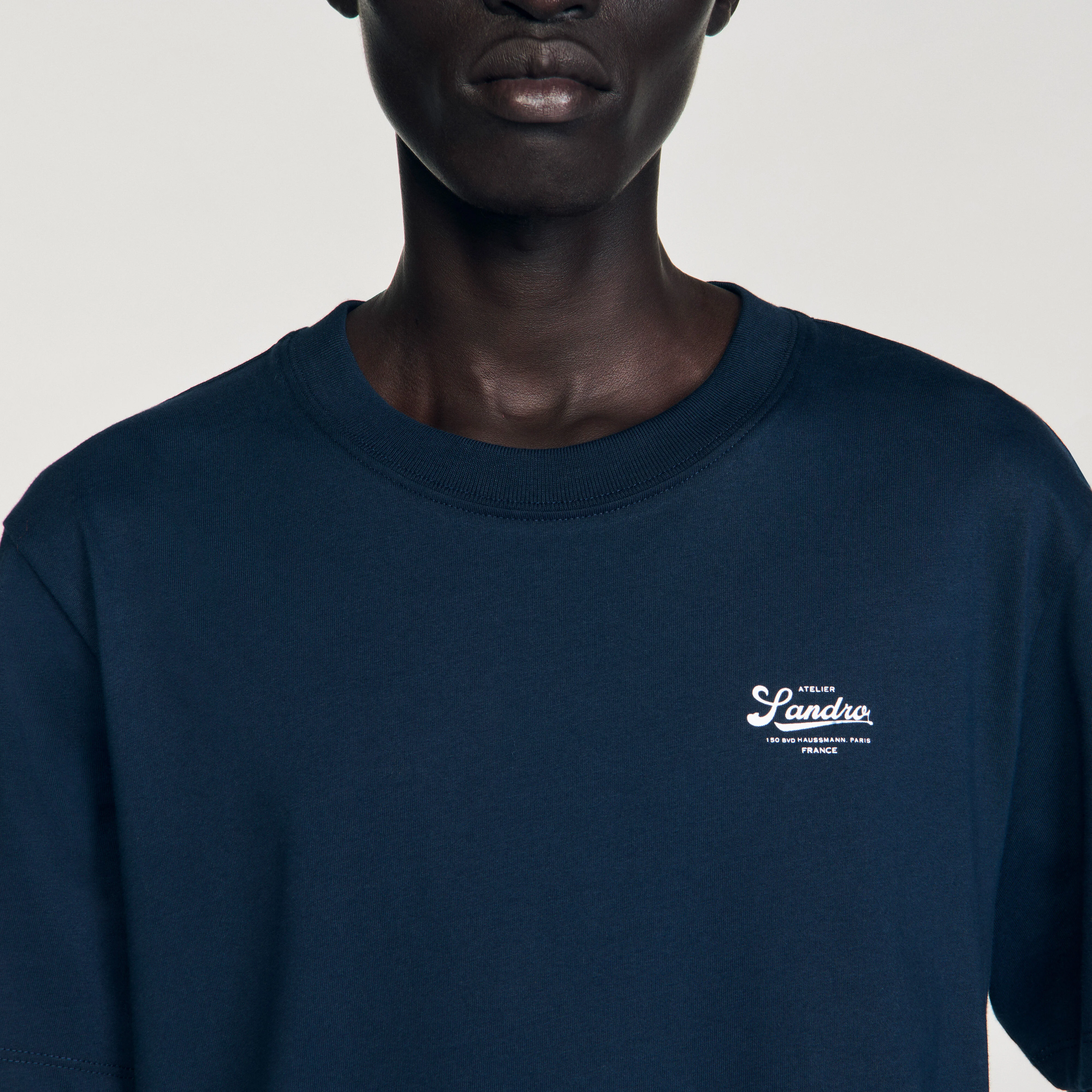 T-shirt med applikationslogotyp