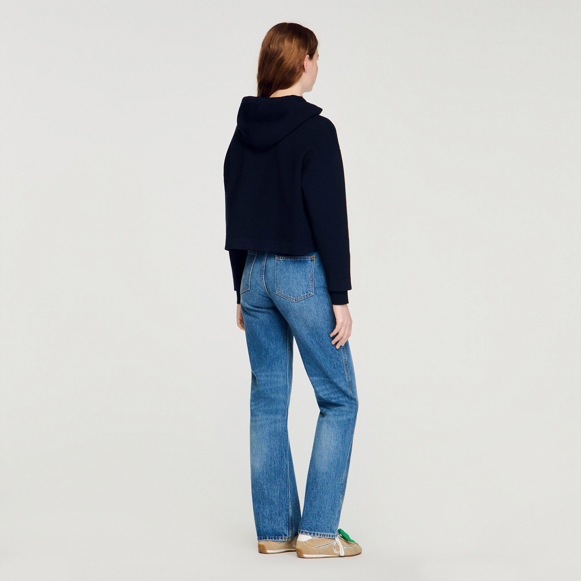 Tröja i vattenkraft och denim