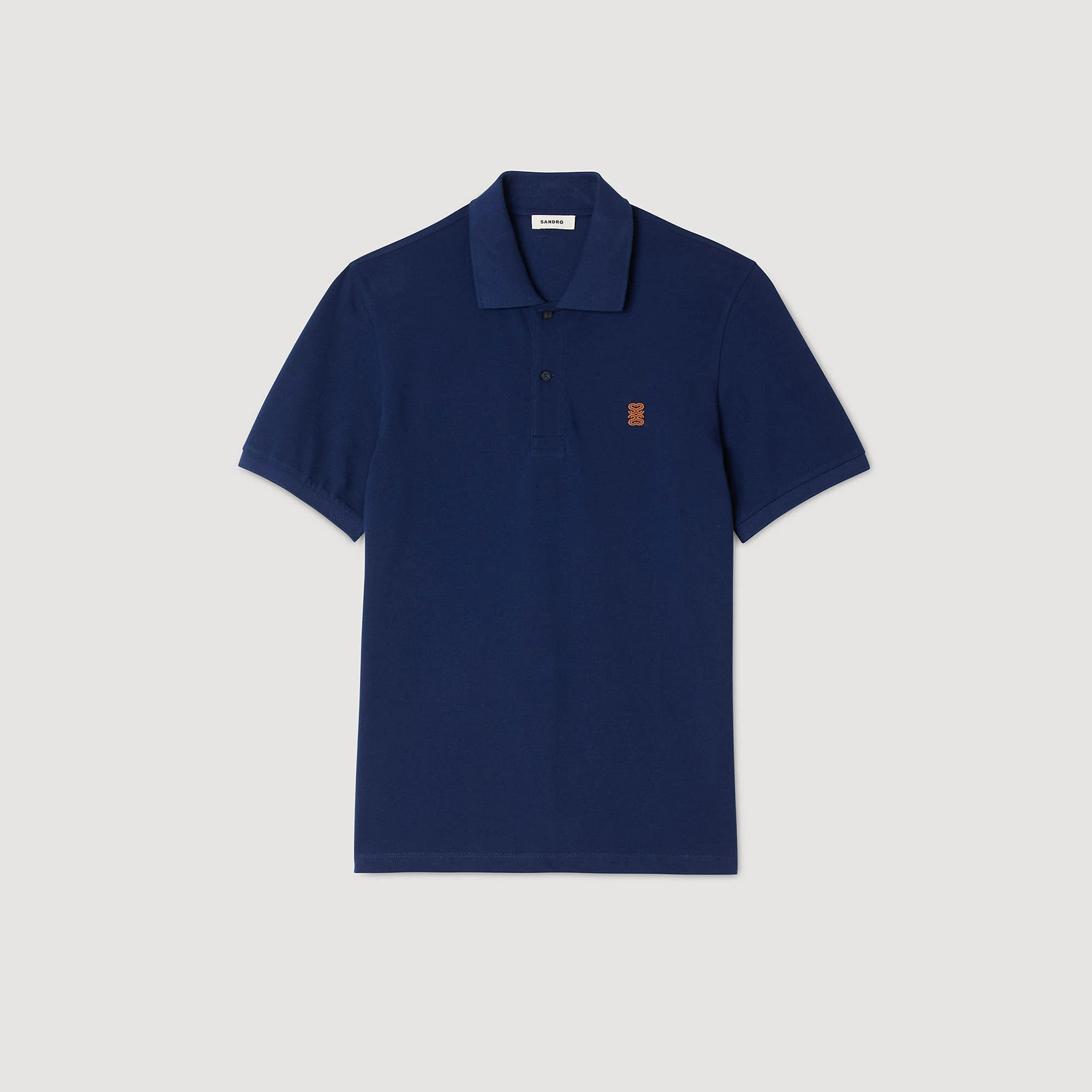 Polojacka med läderlogotyp