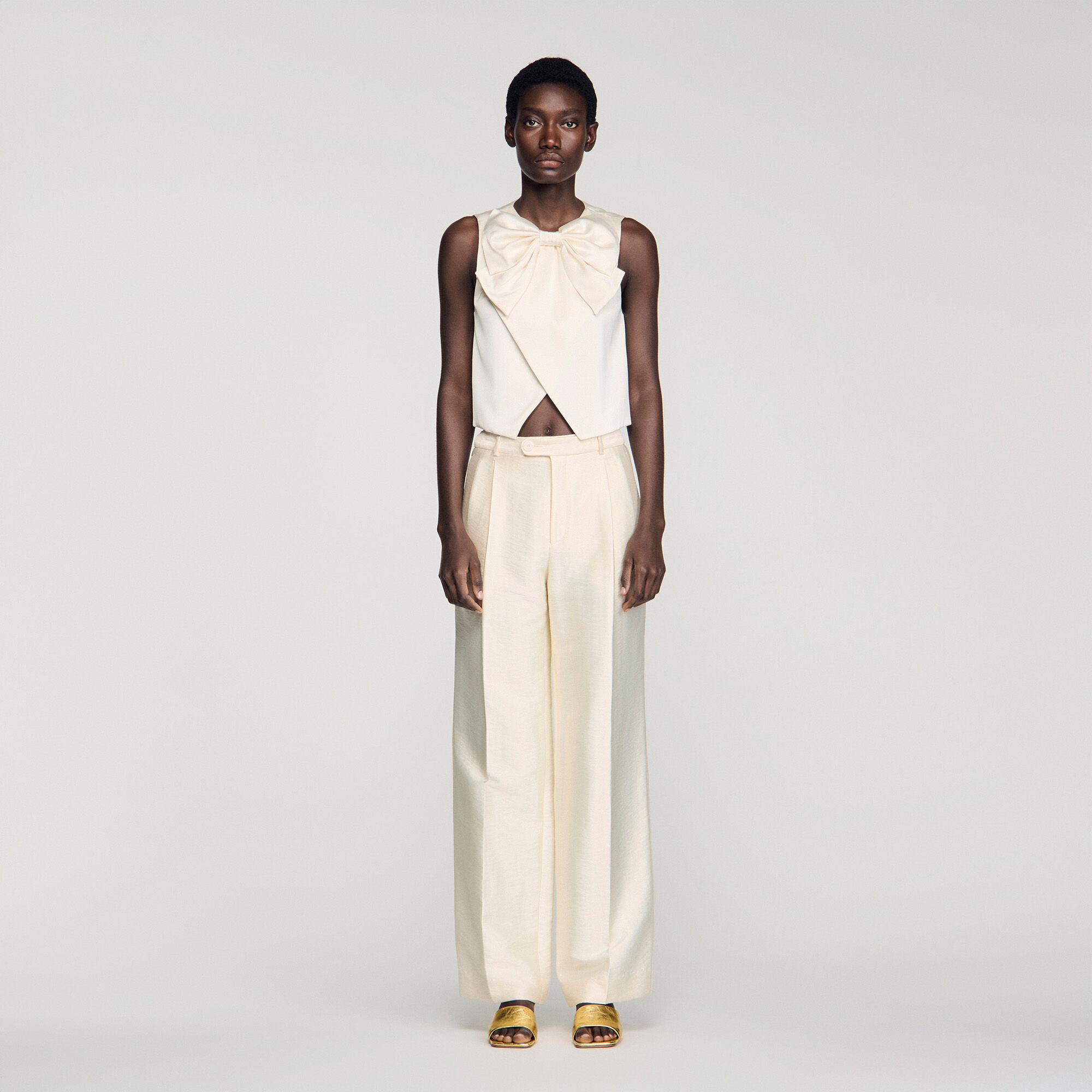 Skiftande knut crop top