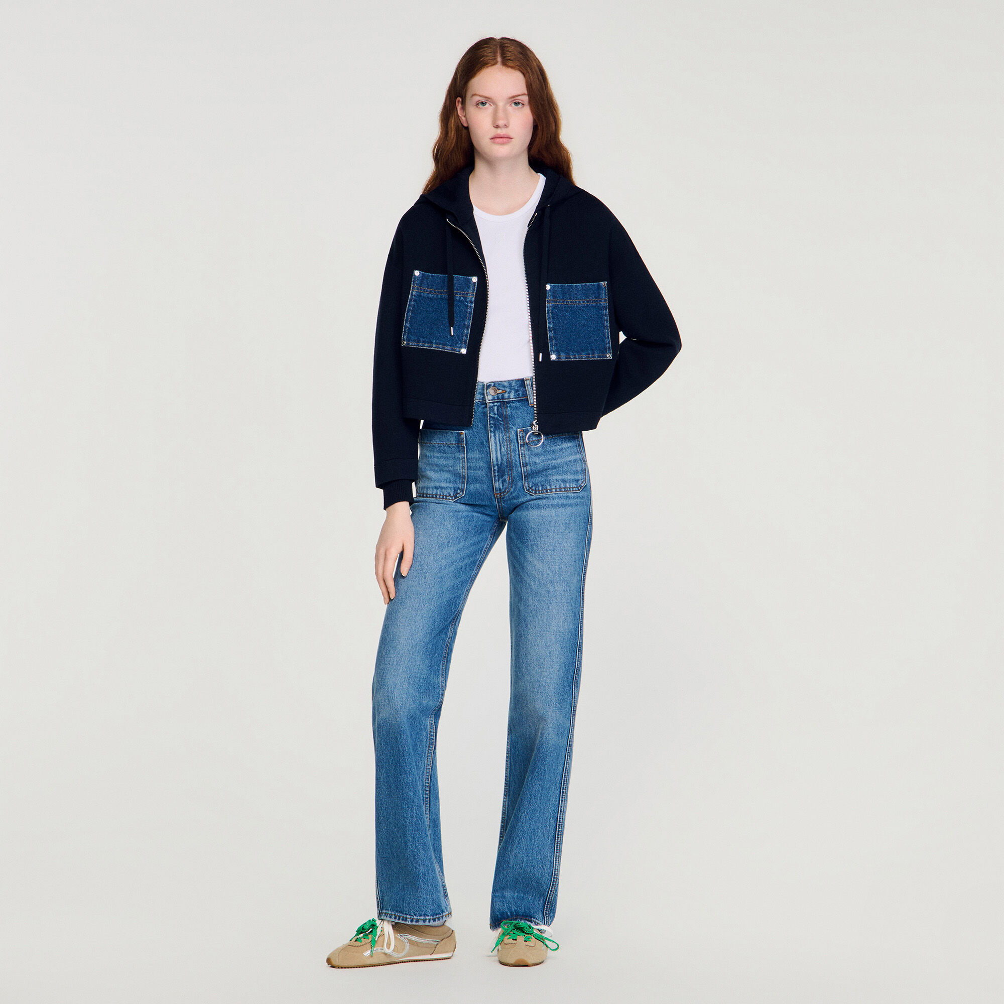 Tröja i vattenkraft och denim