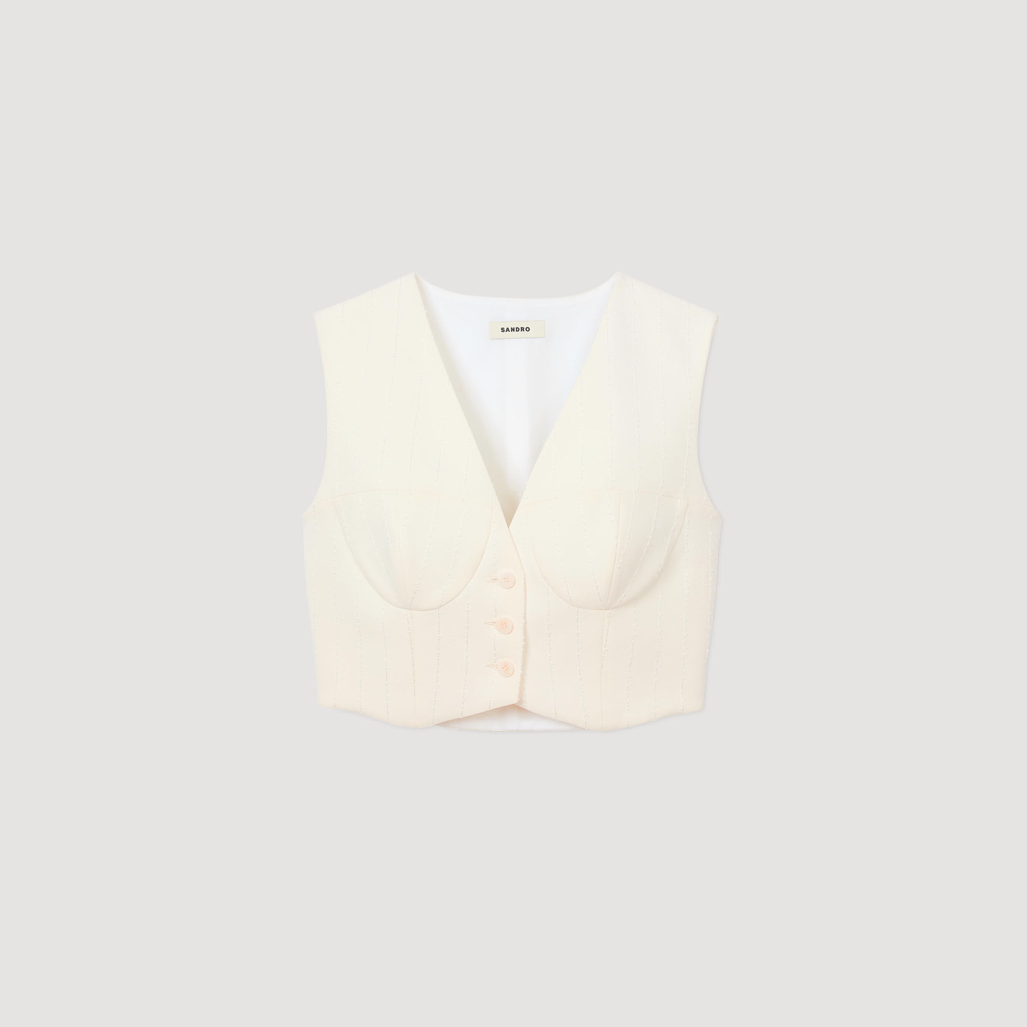Glittrande kort vest