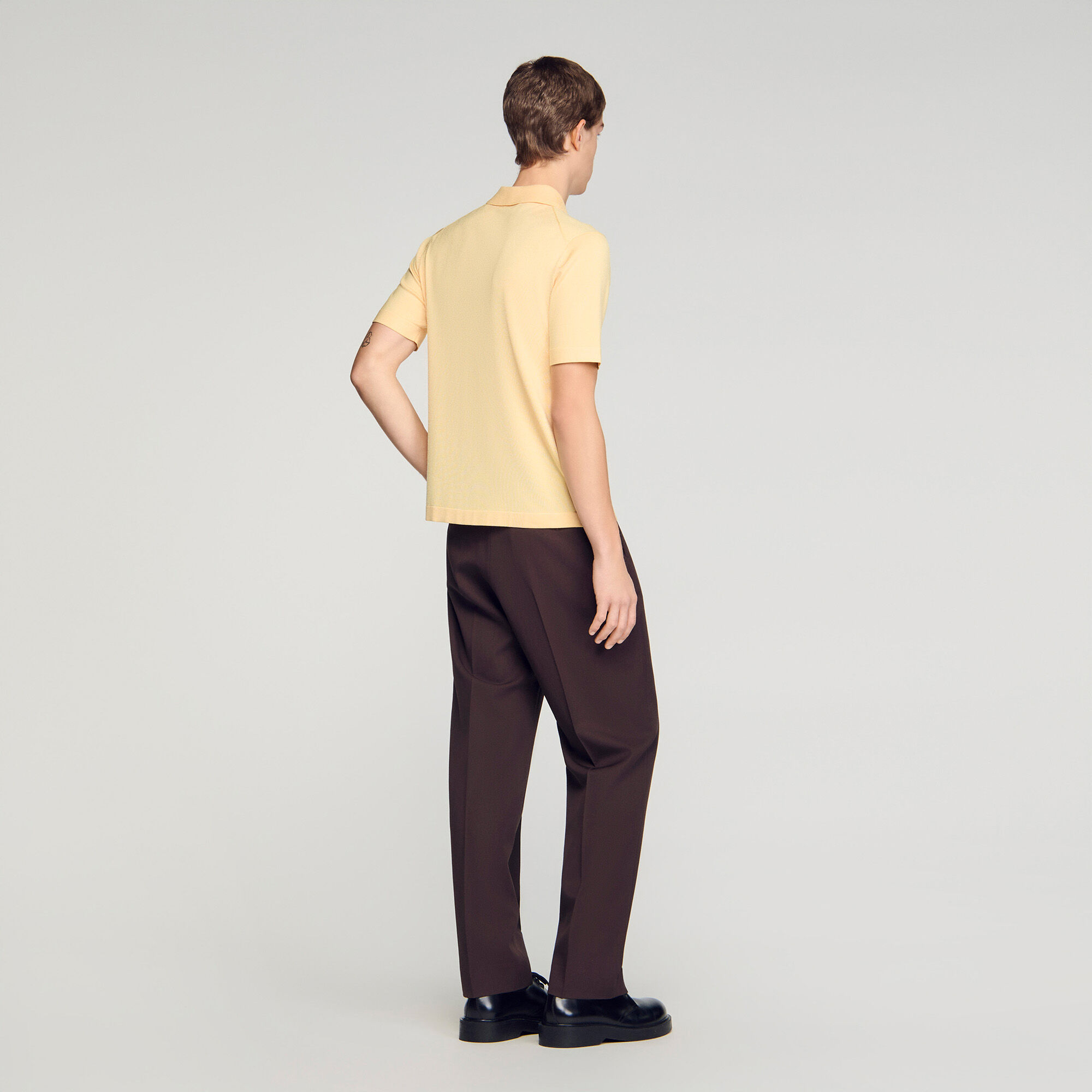 Strumpbyggd poloshirt med dragskärv