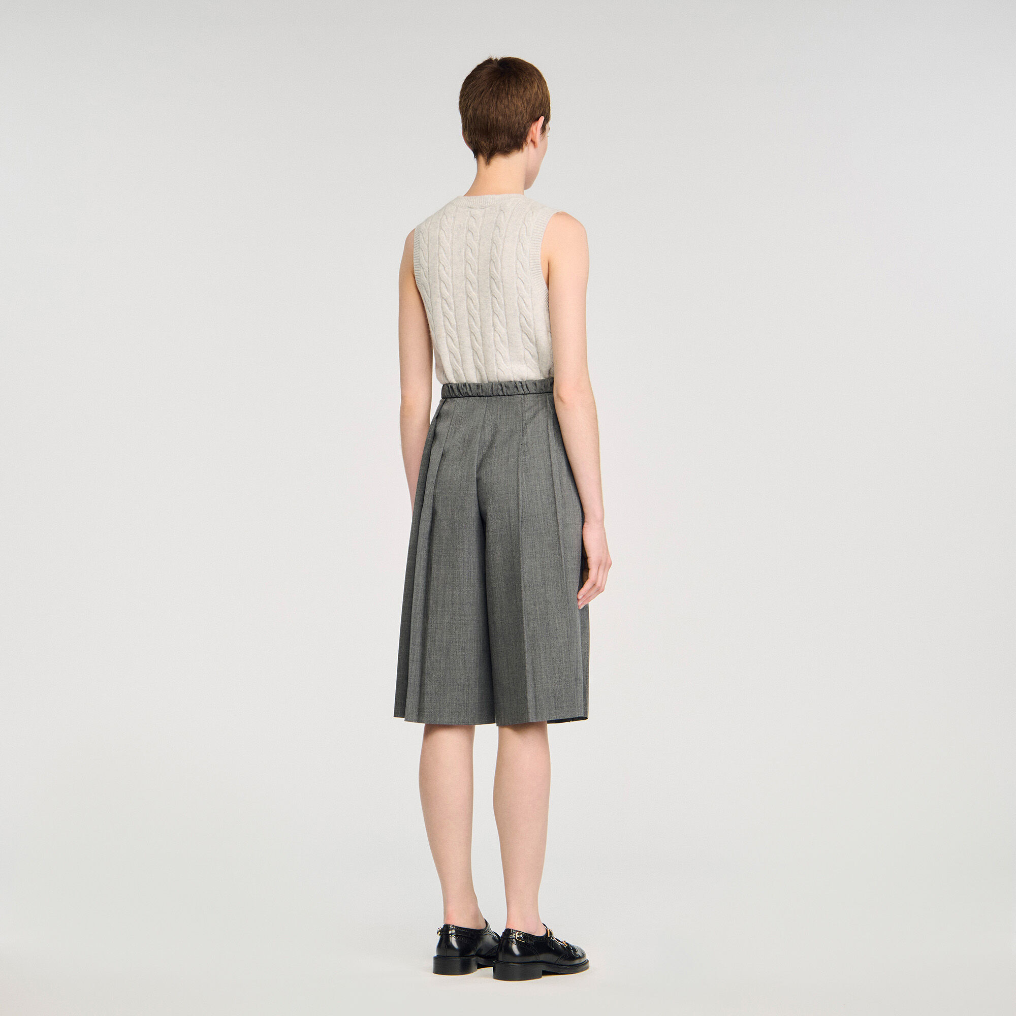 Flikkade långa shorts